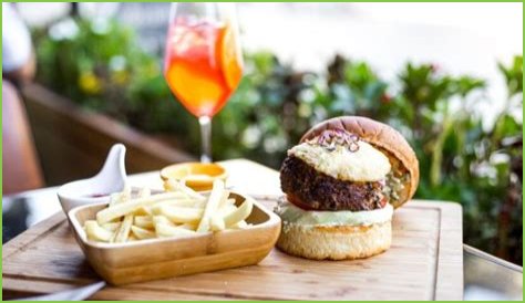 Delighting Your Taste Buds: The Perfect Pairing Of Cheeseburger And Grape Snow Cone